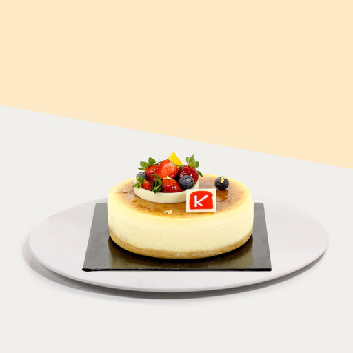 Classic New York cheesecake with a biscuit base, topped with fresh fruits
