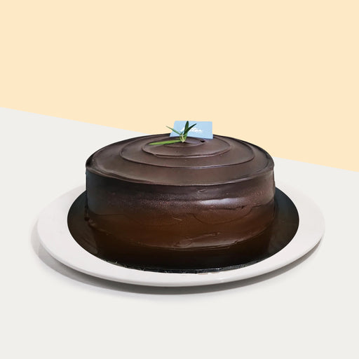 Cake coated in chocolate ganache