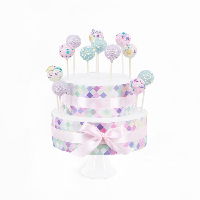 Hard-shelled cake pops with mermaid scales design 