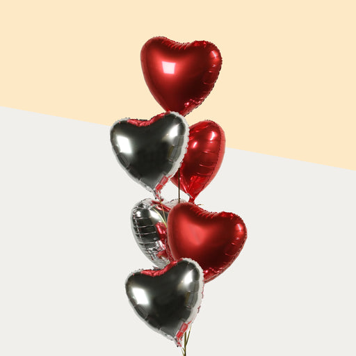 Red and silver foil heart balloons