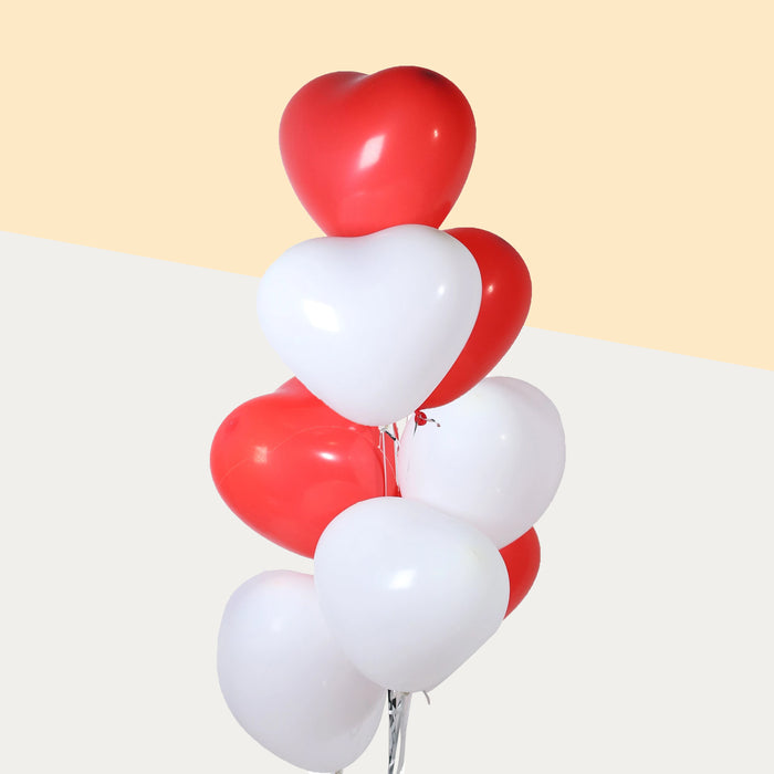Red and white heart shaped balloons