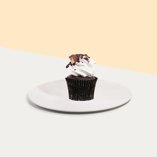 KitKat stuffed cupcakes, with cookies and cream frosting, and KitKat chunks