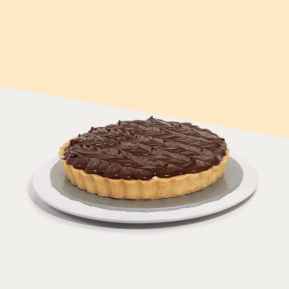 Cream cheese filled tart, topped with Nutella spread