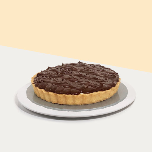 Cream cheese filled tart, topped with Nutella spread