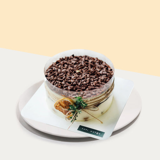 Cocoa and espresso tiramisu with whipped cream and mascarpone cheese