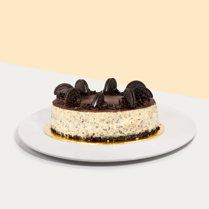 Cookies and cream cheesecake, with an Oreo base, topped with additional Oreo pieces