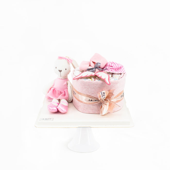 Pink diaper cake, with a bunny plushie