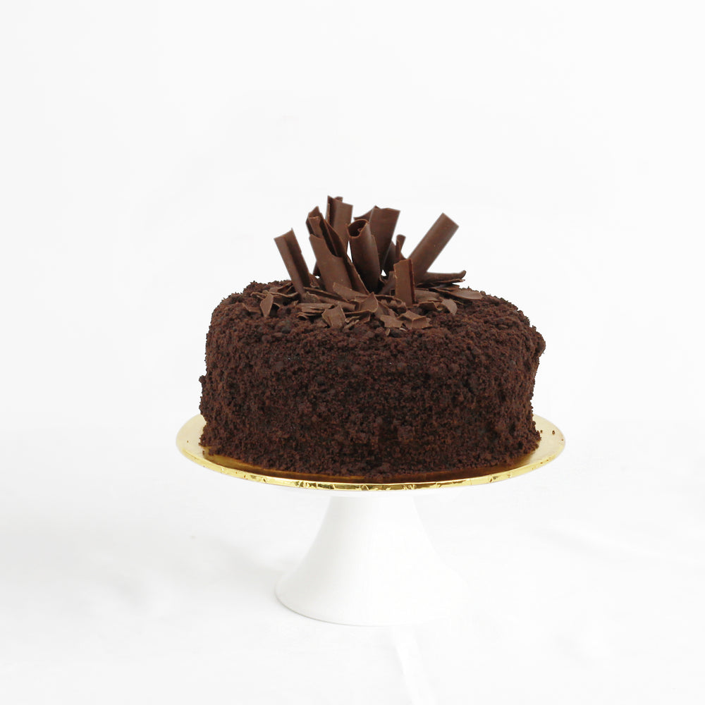 Extreme chocolate cake, with chocolate cake base, chocolate ganache between layers, and coated with chocolate shards