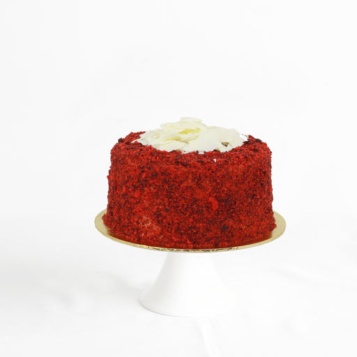 Classic red velvet cake with white chocolate flakes