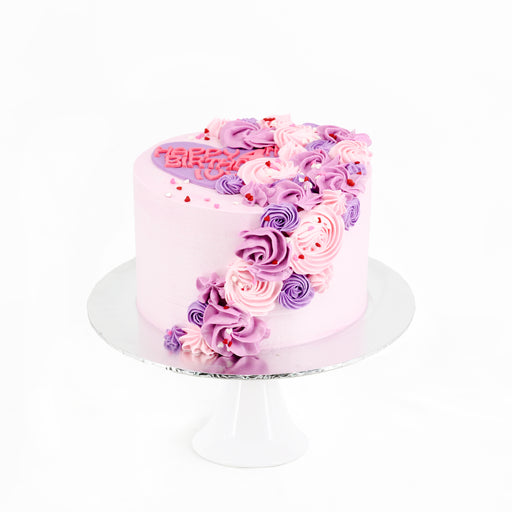 Buttercream light pink rosette cake