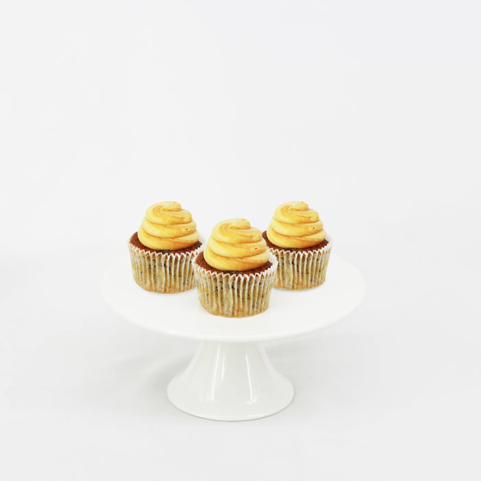 Moist banana cupcakes topped with butterscotch cream cheese