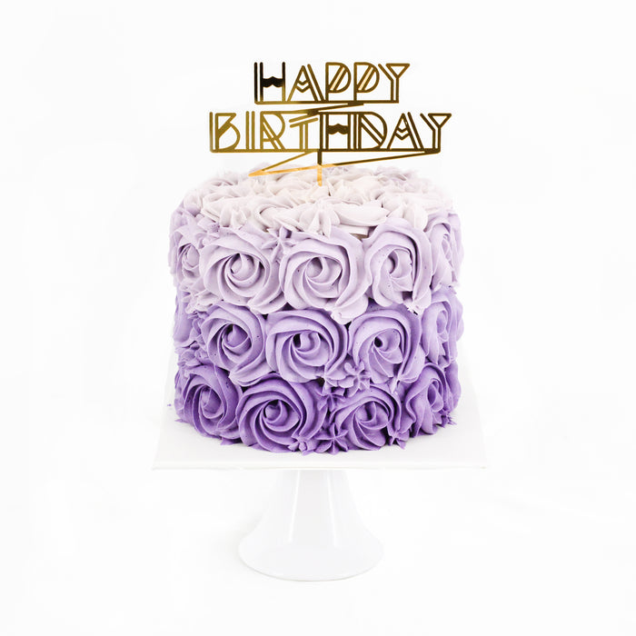 Purple gradient rosette cake with hand piped rosettes
