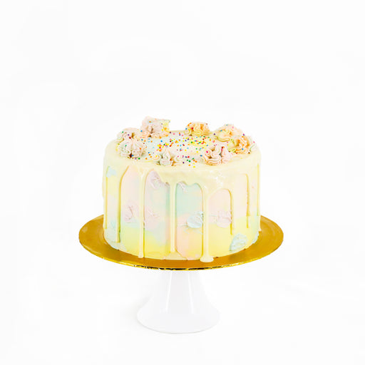 Rainbow vanilla butter cake with cream cheese layers