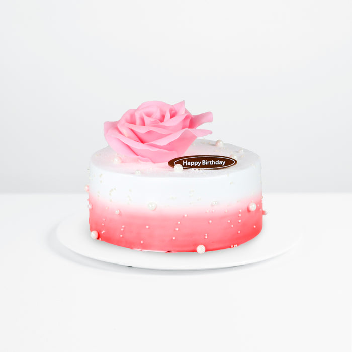 Chocolate chiffon cake with blueberry filling with rose petals made of chocolate fondant
