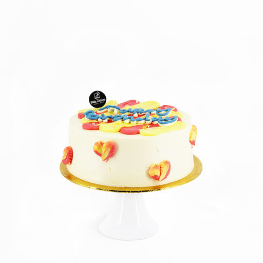 Korean inspired cake decorated with red and yellow buttercream