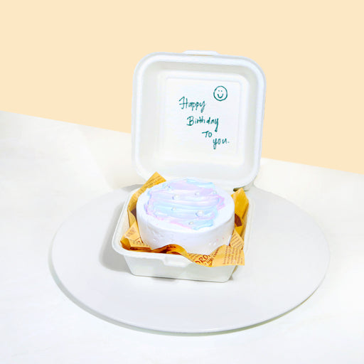Lunch box cake/ bento cake with pastel cream painted on top