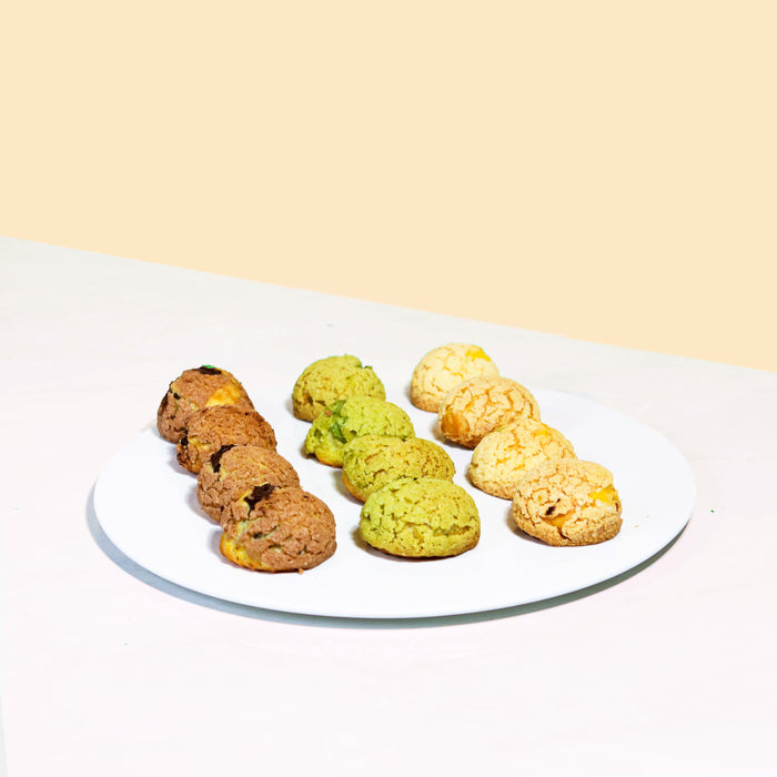 Craquelin cream puffs, with matcha, lemon-orange and chocolate fillings