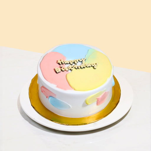 Korean minimalist pastel cream cake, with pink blue and yellow swipes
