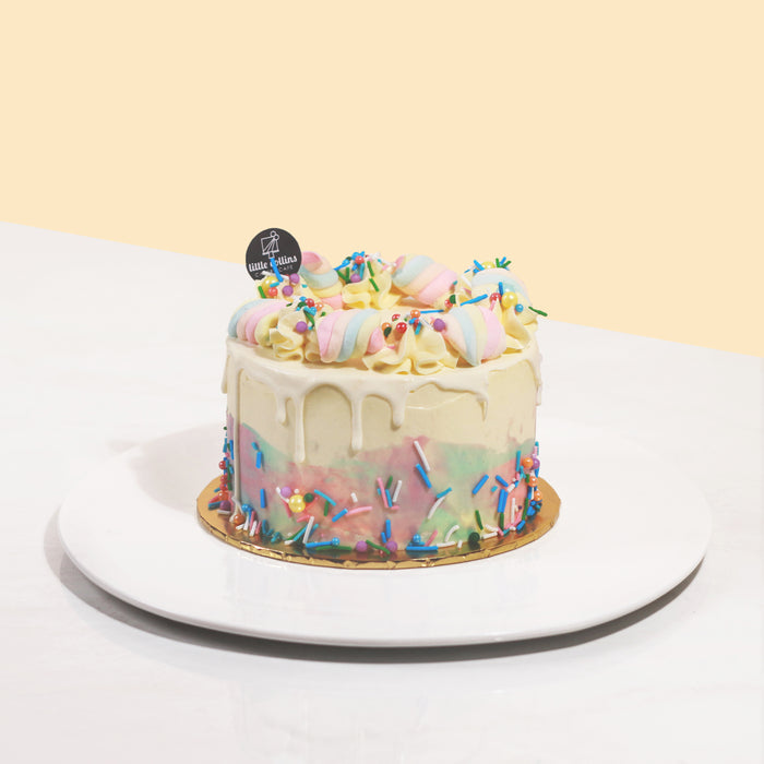 Little Collins rainbow cake, topped with marshmallows