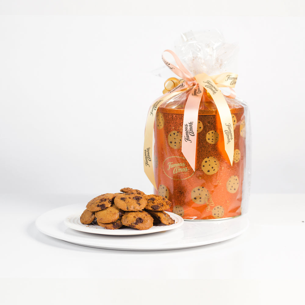 360g of Famous Amos cookies with a reusable orange tin 