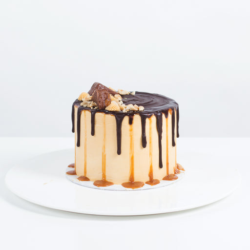 Chocolate cake with salted caramel buttercream, peanut butter buttercream and salted caramel
