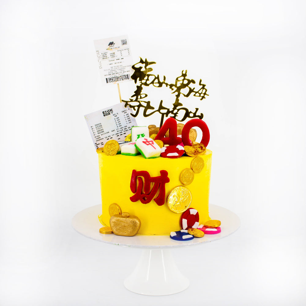 Prosperity cake with 'Toto'/ '4D' design elements, and mahjong tiles with money pulling mechanism
