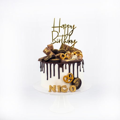 Classic buttercream cake with chocolate treats painted in gold on top, with money-pulling mechanism