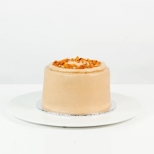 Marble coffee chiffon, filled with Dalgona coffee, and frosted in coffee buttercream