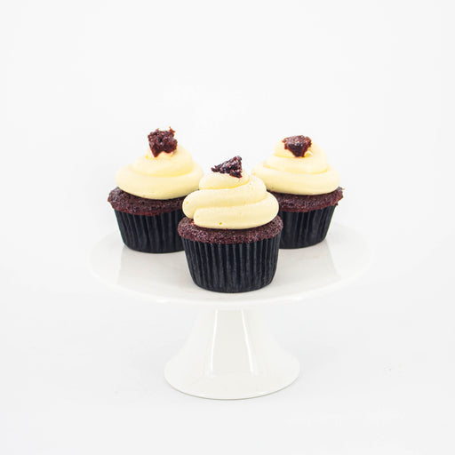 Red velvet cupcakes with cream cheese, and hints of coffee and cocoa
