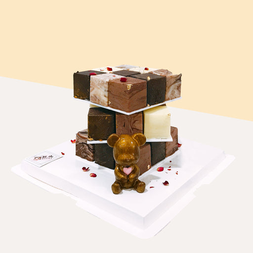 Marble chocolate cubes stacked to resemble a Rubik's Cube