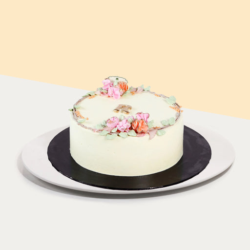 Korean inspired buttercream cake, decorated with hand piped flowers, and an initial of your choice