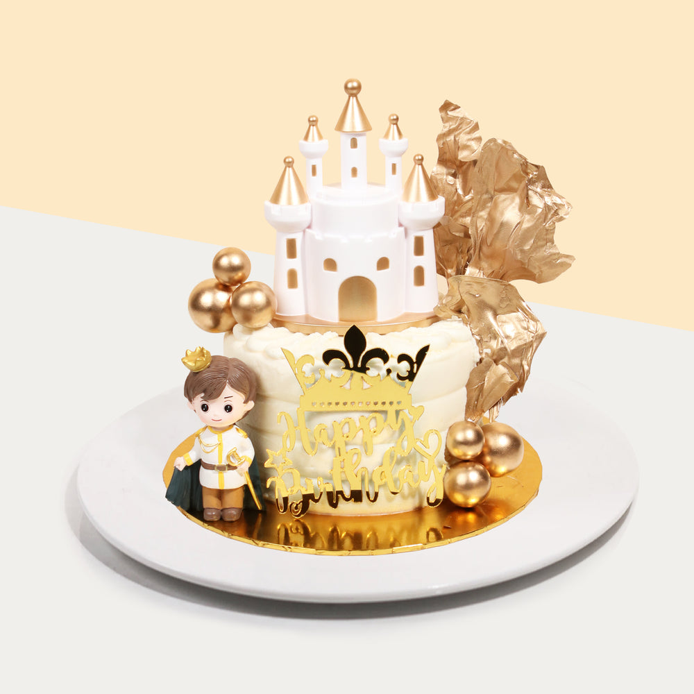 White buttercream cake with a royal prince decoration