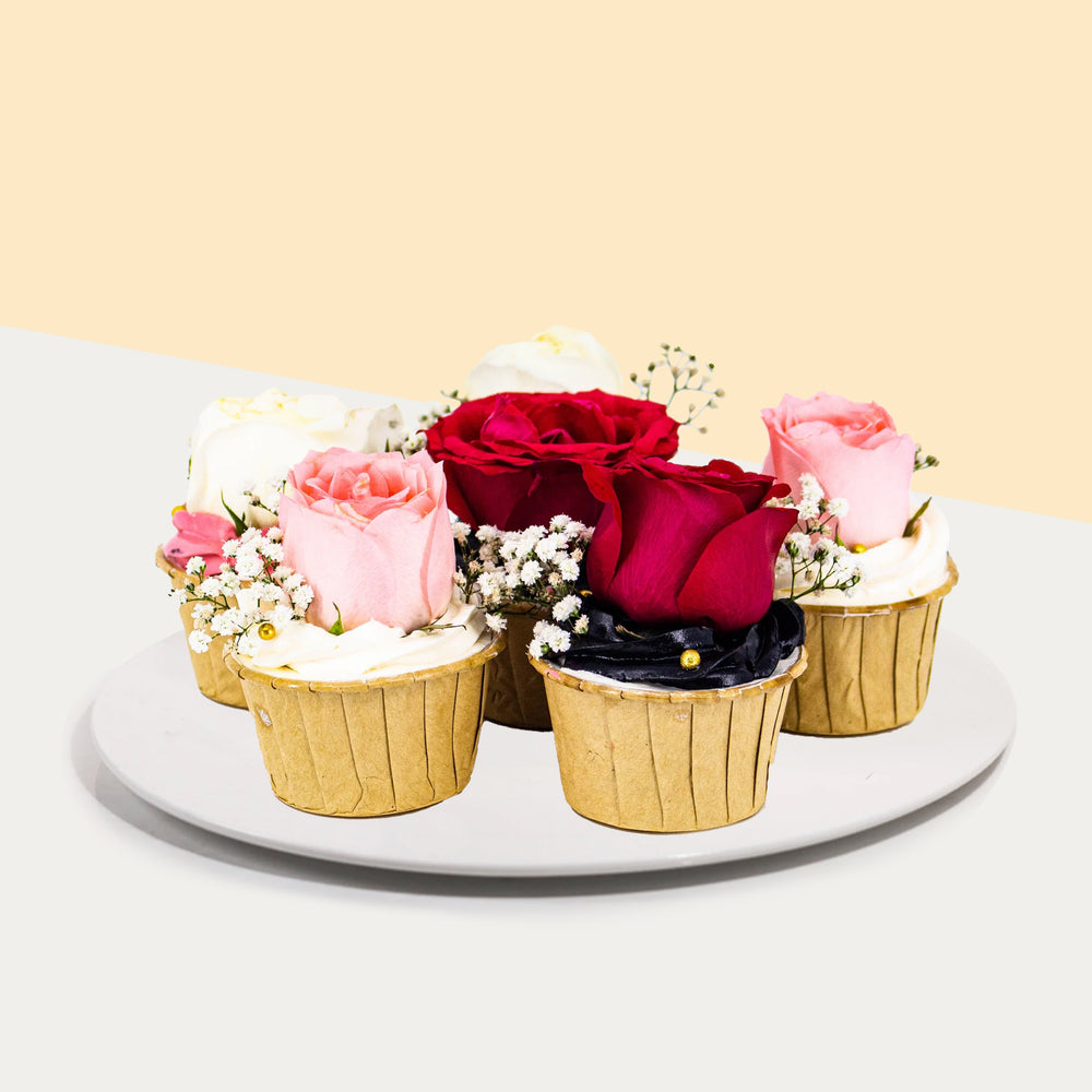 Rose cupcakes, topped with real roses and baby breath
