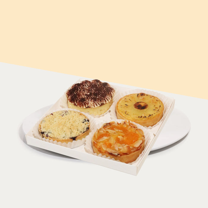 Four rustics tarts with Tiramisu, Blueberry Crumble, Mandarin Almond Tarts