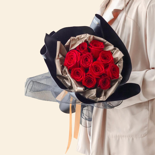 Classic red rose bouquet, wrapped in black paper