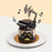 Butter cake designed with musical instruments toppers and figurine