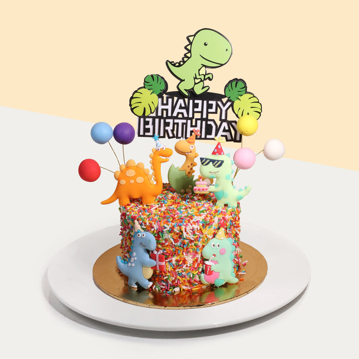 Funfetti cake decorated with dinosaurs