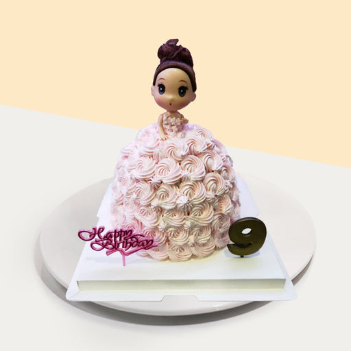 Doll cake with buttercream piped rosettes