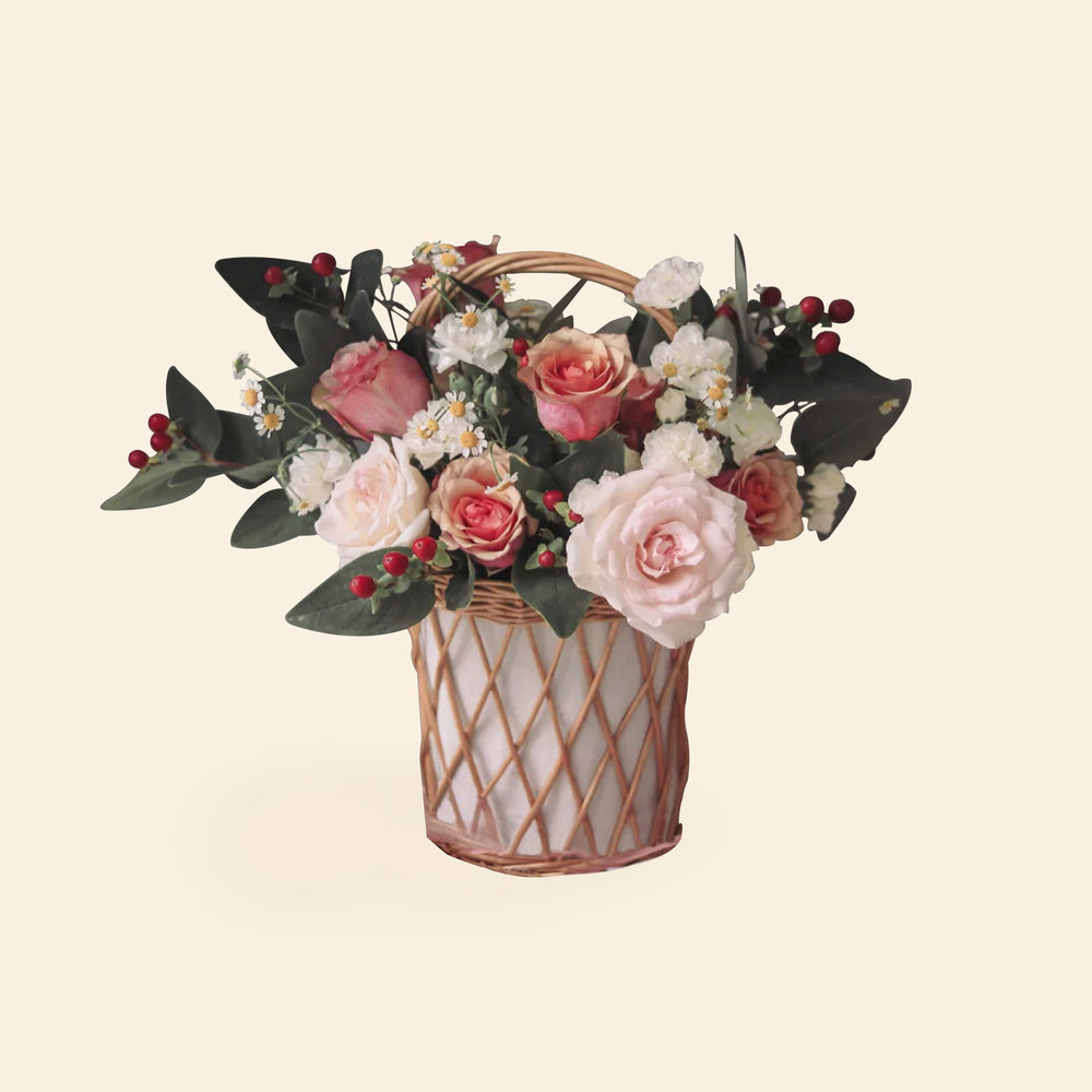 Pink garden roses and mini spray roses basket