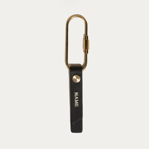 Black leather and brass keyring with engraving