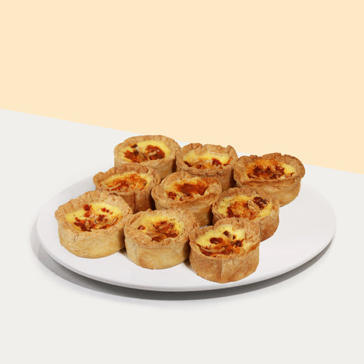 Nine pieces of quiche with kimchi, chicken, mushroom, onion and cheese