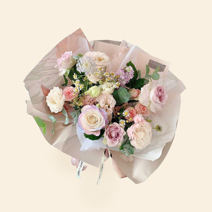 Bouquet of flowers with Lilac Matiholla, Light Pink Eustoma, Ocean Song Rose, Matricaria, Spray Rose, Cinerea & Trachymene