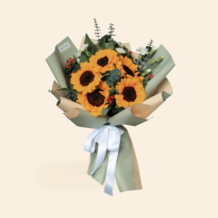 Sunflower bouquet with green and yellow wrapping paper