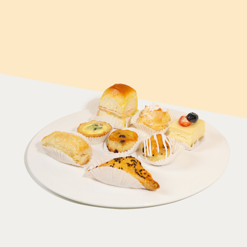 Brunch party set with puffs, sliders, quiche, scones and cheescake