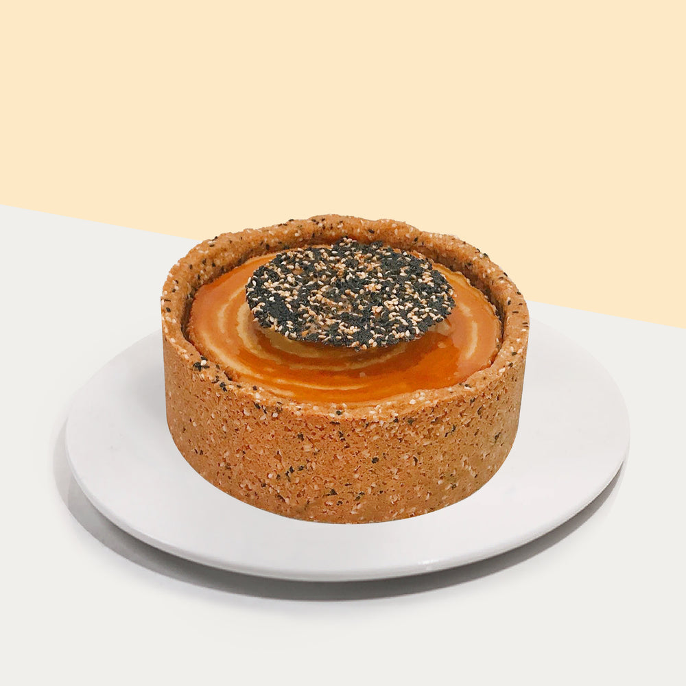 Cheesecake within black and white sesame biscuit