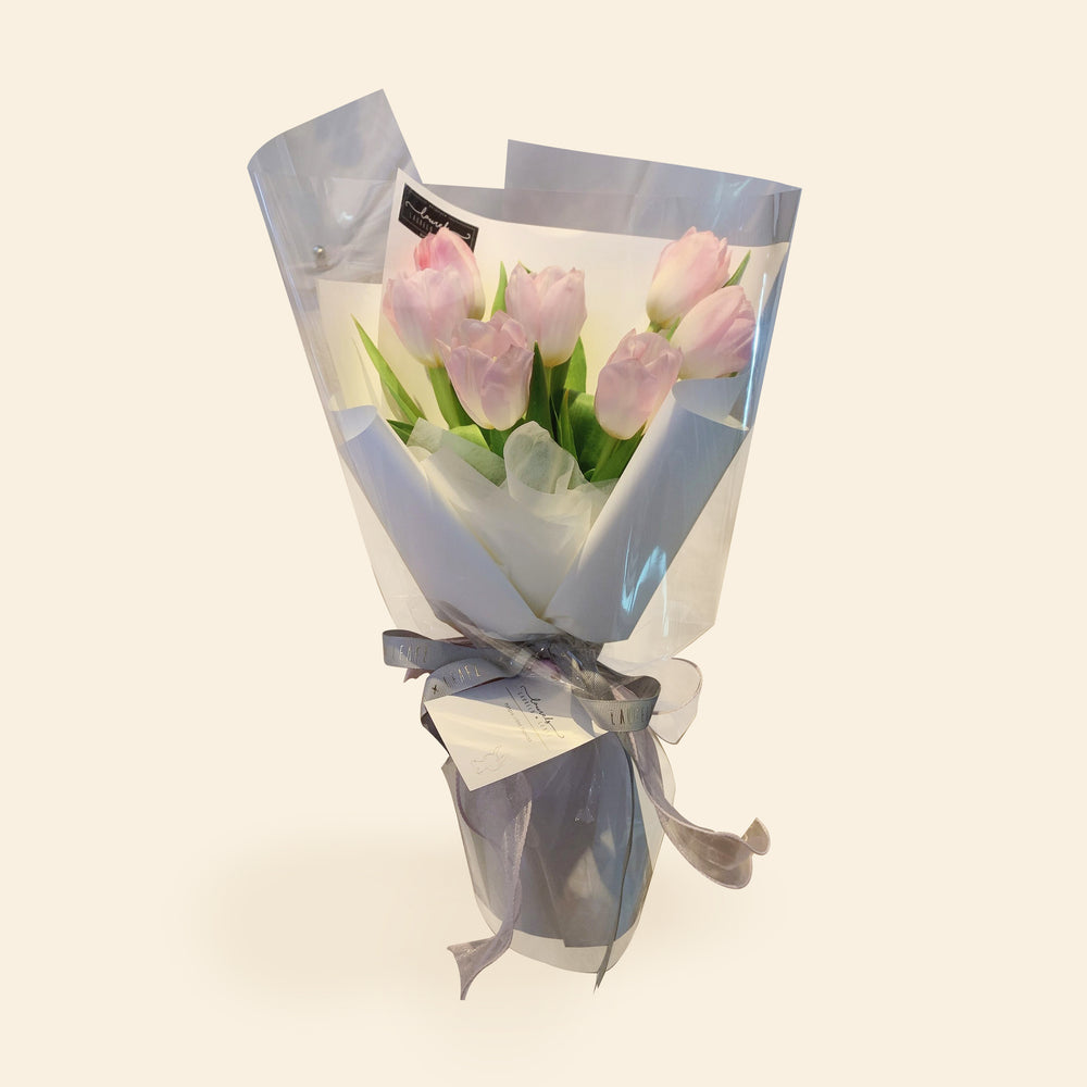 Tulip flower bouquet in silver wrapper