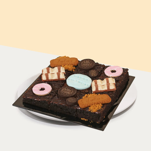Dark chocolate brownies with different toppings of Oreo, Lotus Biscoff, Kinder Bueno and Original