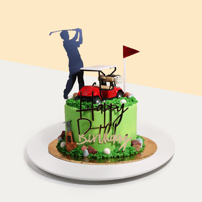 Golf themed cake with a toy buggy and golf bag