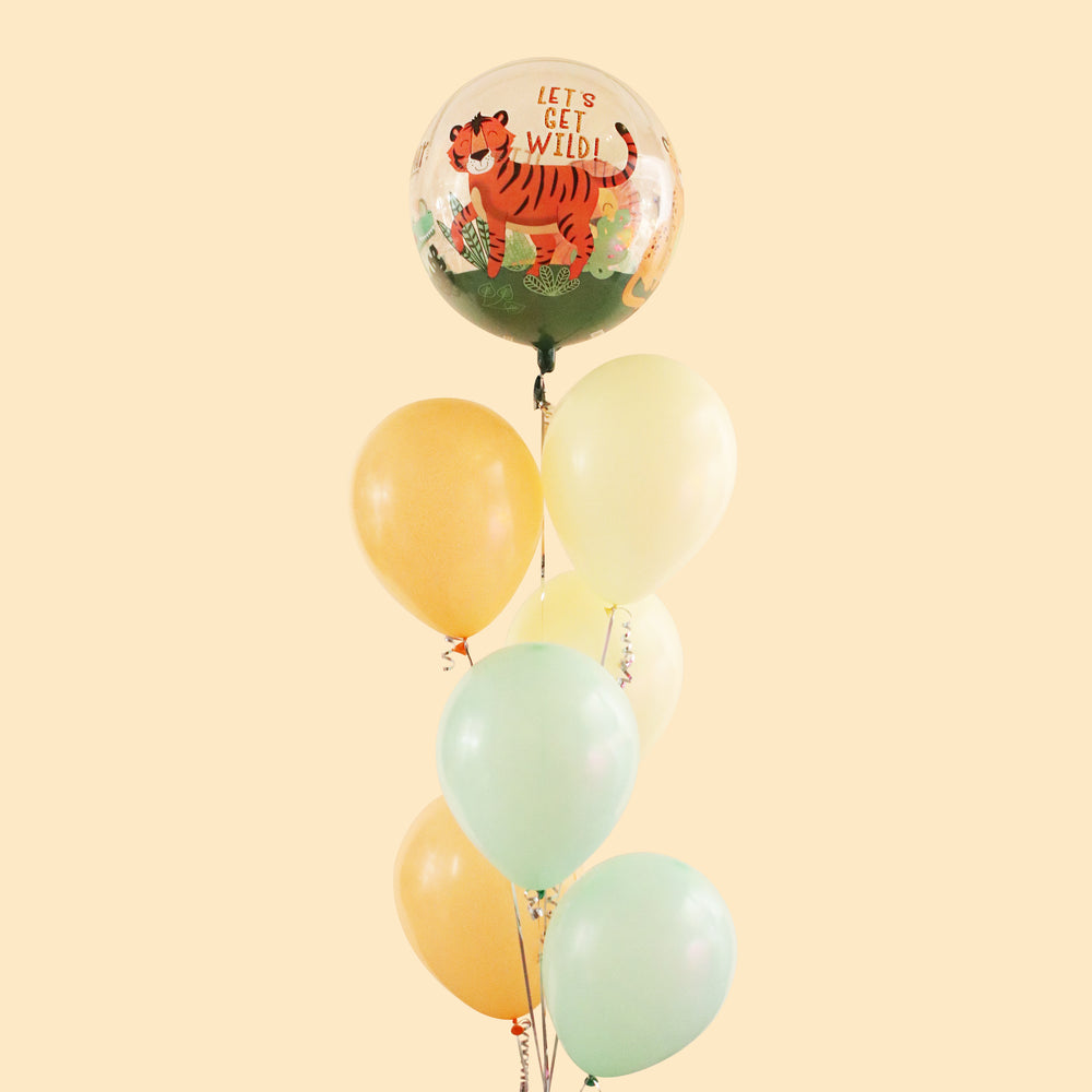 Safari Orbz balloon, with pastel orange, yellow and green balloons