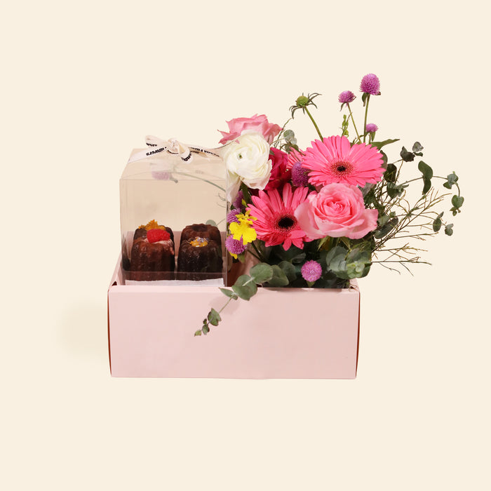 Giftbox with canele, paired with a bouquet of vibrant flowers